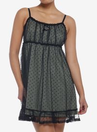 <div>Dress collection feeling a little boring? We've got something adorable for you to slip into! This mesh slip dress features a sage green under layer with ruching at the bust  and comes with a black mesh overlay that has a polka dot design. Complete with lace trim  pockets  a dainty bow at the chest and adjustable cami straps.<div><div><ul><li>100% polyester<li><li>Wash cold; dry low<li><li>32"" length<li><li>Imported<li><li>Listed in junior sizes<li><ul><div>