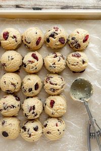 Cherry Chocolate Chunk Cookies are your favorite cookie dough recipe with a fruity twist! This delicious dessert is chewy dark chocolate chunk cookies with tart dried cherry pieces!