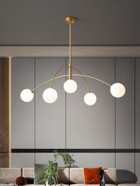 The Valentina Arc Chandelier is a modern lighting fixture that combines spherical and arched design elements. Its versatile design complements any interior and adds a stylish touch above a table or any focal point. Enhance your space with this on-trend piece.   If you have any questions about our products, please get in touch with us and we will reply to you within 24 hours.   Product Size   Size:  Dia  105cm x H 30cm / ∅ 41.3″ x H 11.8″     Details   Material:  Metal, Glass.   Light source:   L