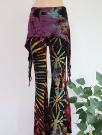 These tie dye splatter bell bottoms are made for movement! Perfect for yoga and flow activities. Handmade and hand-dyed, available from a variety. The fitting around the thigh is flattering & shaping until the material billows out at the knee into a wide flare.  The material consists of a quality rayon Lycra blend; giving softness And stretching. Due to the unique nature of hand dying no two patterns are exactly alike, we will match pattern as close as possible. You will get the color combinatio