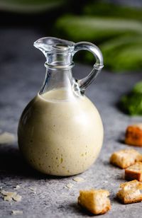 This homemade Caesar Salad Dressing takes 10 minutes to make! Use it in salads, pastas, and marinades! #homemadesaladdressing #saladdressingrecipes #chickencaesarsalad