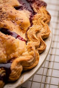 Using a few simple ingredients and an easy folding technique, you can make super flaky pie crust at home. This recipe yields a flavorful puff pastry-like flaky pie crust that will leave everyone impressed.