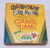 Vintage Crayola Color-N-Play Fold-A-Book, from 1978. Two-sided cardboard "pages" with a shiny surface that can be colored and re-colored on with crayons. Item is vintage and shows some signs of wear. There may also be some minor non-crayon marks inside.