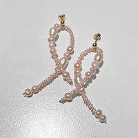 - Structural earrings with various luscious baroque pearls in 18k gold plated sterling silver studs - Dimension: Approx. 35mm (w) x 70mm (l) - Piercing earrings with butterfly closure - Slight variation due to the use of natural materials *All pieces are handcrafted and made-to-order *Please allow 2-5 business day for production *Please allow slight color variations due to different settings of monitors.