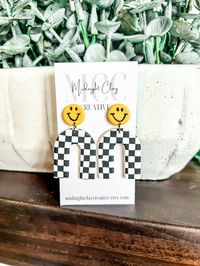 Add a little retro to your style with these cute smiley face checkered arches!  Smiley is hand painted -  Handmade with polymer clay, lightweight and hypoallergenic.  Each pair includes rubber backs.