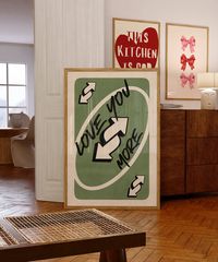 ♥️🃏 "Love You More" Green Retro Wall Art - A Playful and Loving Touch for Your Space 🃏♥️ Bring a touch of nostalgia and affection to your home with our "Love You More" green Retro Wall Art! This unique design, inspired by the iconic  pink Uno card, features the heartfelt message "Love You More" in a playful and stylish typography. Perfect for adding a splash of color and love to any room, this print is a must-have for those who appreciate fun and trendy decor. As part of our Playing Card Wall