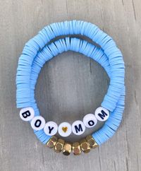 "Boy Mom Bracelet 💙 Are you a boy mama? You will love this set. Buy separately or together. Clay beads, gold beads, and \"Boy Mom\" letters with heart.  In Personalization section put the color of beads you would like and if you would like something different than \"boy mom\" See color chart in photos* CARING TIPS FOR YOUR JEWELRY ⭐️Treat and store with care. ⭐️ For longevity, avoid exposing your jewelry to water. ⭐️ Avoid having direct contact with lotions, perfumes, sanitizers as these chemic