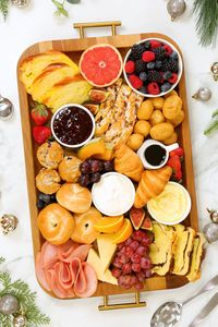 This delicious breakfast board is absolutely perfect for Christmas morning! It is loaded with delicious bite sized Ready Made Sides from Walmart including a tasty sliced Brioche Loaf, a yummy Cinnamon Pecan Braid, some bite-sized Mini Pancake Wrapped Sausage Bites, plus lots of fresh fruit, cheese, deli meat and bagels! Thanks to Walmart for partnering with me on this post! #Ad #HostGameStrong