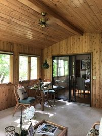 Transforming our Knotty Pine Porch from Dated to Modern- Without Paint! - Sima Spaces