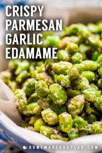 Crispy Parmesan Garlic Edamame! Baked in the oven, this edamame recipe is a tasty snack with only 123 calories! A filling food that will help you reach your weight goals. | HomemadeHooplah.com