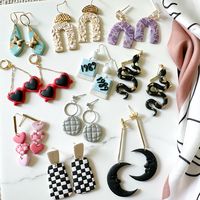 Super cute and trendy eras tour earrings for your favorote swiftie! Each era included in order: Debut, Fearless, Speak Now, Red, 1989, Reputation, Lover, Folklore, Evermore, Midnights