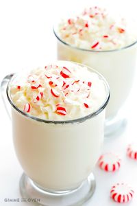 Serve up a big steamy mug of this Peppermint White Hot Chocolate! It has only 4 ingredients! Visit our 100 Days of Homemade Holiday Inspiration for more recipes, decorating ideas, crafts, homemade gift ideas and much more!