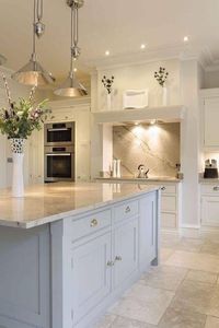 Travertine floor white kitchen