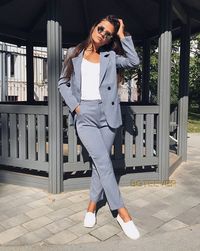 This gorgeous two-piece suit combines beautifully elegant lines and modern simplicity. If you're dressing to impress, this is definitely an outfit you'll love to have in your wardrobe.