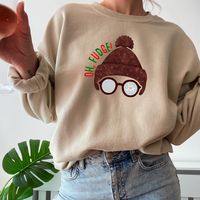 This 'Oh Fudge' sweatshirt is inspired by a Christmas story, perfect for cozying up during the holiday season. It gives off a festive and nostalgic vibe, making it a great addition to your winter wardrobe. The unisex design is suitable for anyone looking for a comfortable and stylish sweatshirt to wear during Christmas celebrations. DETAILS: Printed on a super soft, cozy Gildan hoodie sweatshirt. Made with a thick blend of cotton and polyester, it feels plush, soft and warm, a perfect choice for any cold day. FABRIC:  50% cotton, 50% polyester, Made from specially spun fibers that make for a very strong, smooth fabric. Polyester fibers are extremely resilient, resistant to most chemicals, stretching, and shrinking. Heather Sport colors are 40% Cotton, 60% Polyester SIZING GUIDELINES: This