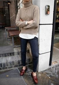 Wear a beige knit rollneck and navy skinny jeans to create a chic, glamorous look. For the maximum chicness grab a pair of brown leather loafers.