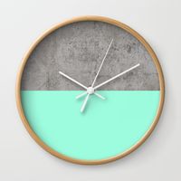 Sea on Concrete Wall Clock https://society6.com/product/sea-on-concrete_wall-clock#33=282&34=285 DESCRIPTION Available in natural wood, black or white frames, our 10" diameter unique Wall Clocks feature a high-impact plexiglass crystal face and a backside hook for easy hanging. Choose black or white hands to match your wall clock frame and art design choice. Clock sits 1.75" deep