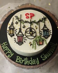 This cake was ordered for someone who has a shop of decorative lights and plants.