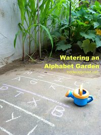 Toddler Approved!: Watering an "Alphabet Garden" using chalk and a watering can. Do your kids like to help you with watering?