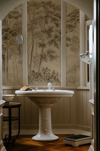 Softly inspired by the sketched artistry of yesteryear, the Garden Affair Wallpaper invokes familiarity and a dreamy sense of nostalgia. With a simple and low-key palette, its subtle detail creates a botanical subject, peaceful and calm. Enjoy the romantic impact of graceful exterior natural inspiration in an indoor bath, dining, or living space. Features: Subtle with scant in-depth detail, its treescape botanical print brings nature indoors A tasteful print remains low-key to accommodate bold p