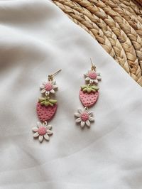 - Earrings are approximately 2" in length and weigh less than 1oz. - All of our earrings are made with durable polymer clay and (nickel-free) surgical stainless steel posts.