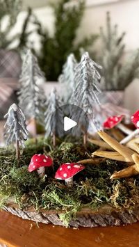 Erin Sowell on Instagram: "Betcha didn’t see that coming!!!! 

Trees made outta hot glue…say what??? 
Did you even know that was possible? These little pine trees are so fun and easy to make using nothing more than lollipop sticks and hot glue! 

I love making these each year and using them in my fall and winter decor. By simply drizzling hot glue across the sticks as shown in a tree shape and let dry, they pop right off my silicone mat and are ready to be painted. I used green chalk paint for the tree “branches” and brown for the “trunk”. When dry, I stuck them right into little holes I drilled in a slab of wood, added moss, mushrooms and antlers for a pretty decor centerpiece. 

They can also be easily inserted floral foam and added to floral arrangements, used as ornaments and more! I e