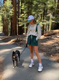 Unleash your inner fashionista on the trails with these stylish hiking outfits for women! Whether it's spring or summer, these cute looks will elevate your outdoor experience. For example, we love this casual ensemble with green shorts, which also doubles up as a dog walking outfit!