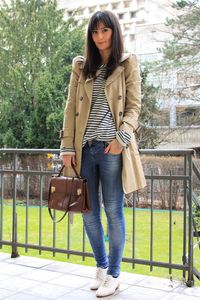 Light jacket, grey top, brown bag, jeans, pale brogues