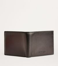 Find GIORGIO ARMANI Lamb Leather Bifold Wallet on Editorialist. The best accessories whisper as to their brand identity, a fact Giorgio Armani understands better than most. Crafted from luxurious supple leather, this bifold wallet from the Italian wallet features a subtle debossed logo and ample card slots for all your financial essentials.