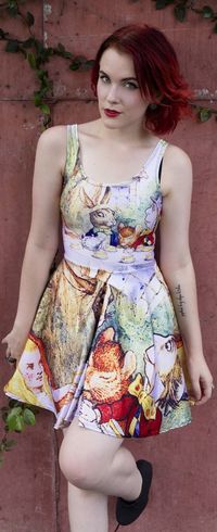 Why is a raven like a writing desk? Don't be late for tea in this beautiful John Tenniel illustration dress from the Adventures of Alice in Wonderland by Lewis Carroll, featuring Alice, the Mad Hatter, the March Hare and the Doormouse at their famous Tea Party