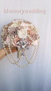 Wedding luxury brooch bouquet. Rose gold jeweled wedding bridal crystal bling boquet wedding favors wedding wedding ideas, wedding fashion, wedding inspiration, wedding planning ceremony design, wedding photography. Bridesmaids wedding, bridal ideas. Cascading pearls bouquet. Champagne, blush pink pearl beads.