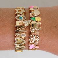 Personalized Gold and Rose Build Your Own Charm Bracelet. Gold charms.