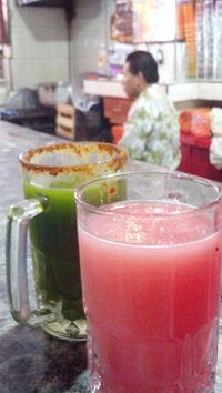 Curado de apio y curado de guayaba. Guava pulque and celery pulque. Pre-hispanic fermented and flavoured drink from cactus. Pulqueria "Los Danzantes"