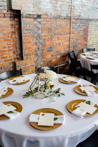 Classic Gold & White Wedding Inspiration at The Millbottom, Industrial Wedding Venue in Missouri. Gold Chargers, Gold Terrariums, White Flowers, Black and White Details. Wedding Planning from Plan it Terra, by Terra Nickelson. Missouri Wedding Planner.