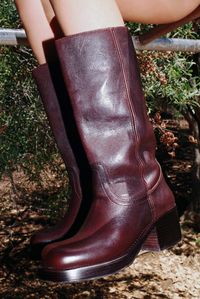 Mid-calf heeled boot Fits true to size Measurements taken from a size 7 2.5" Heel, 0.75"Platform Leather Upper, Leather / Fabric Lining, Synthetic Sole