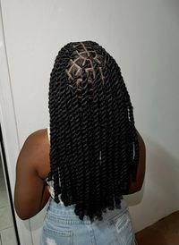 These rope twists feature clean parting and a polished finish, offering a protective yet stylish look for everyday wear. A simple but stunning hairstyle for any occasion. #RopeTwists #NaturalHairCare #DefinedParts #ProtectiveLocStyles #NaturalElegance