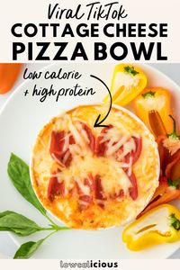 This viral TikTok Cottage Cheese Pizza Bowls recipe is a high protein, low calorie meal made with just a few ingredients. This healthy recipe can be made in 5 minutes. Serve it with raw vegetables like mini sweet peppers as a dip, eat it with a spoon, or make some crostini with keto bread! It makes a great healthy lunch that’s easy to make and is great for meal prep. Healthy cottage cheese recipe from @lowcalicious - visit lowcalicious.com for more delicious low calorie recipes.