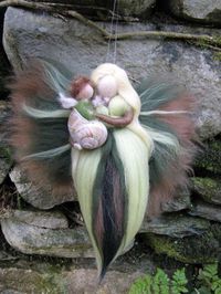 XYLIA- Needle Felted Wool  fairy with baby,nature fairy, Waldorf inspired fairy doll, wool. €19.00, via Etsy.