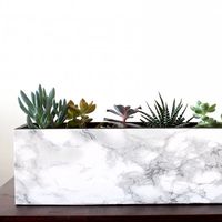 Make your own marble succulent planter, with this quick easy DIY!