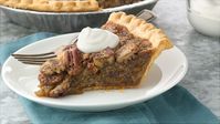 Frozen pie crust and a simple filling combine to make an easy pecan pie. [Variation: add 1 teaspoon of vanilla]