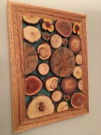 Hand Made in Prescott Arizona, this piece features ponderosa pine, juniper, manzanita and possibly other goodies from the forest :)  Frame is rough cut cedar.  Finished with danish oil.  Custom orders welcome!  keyhole slot in back for easy hanging.  cheers!