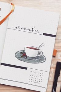 If you're looking for some fall bullet journal theme ideas, check out these amazing coffee themed monthly covers, weekly spreads, and trackers for inspriation! #bujo #bulletjournal #bujotheme #bujoideas