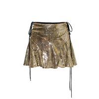 A shiny gold sequin skirt speaks to the glamorous side of the Sveta Milano narrative. Mary silhouette features a regular waist with laces on the sides, while the inside is partially lined. Gold sequins Partially lined Zipped at the back Fabric: 100% polyester  Lining: 100% silk Dry clean Made in Italy Made of Milan