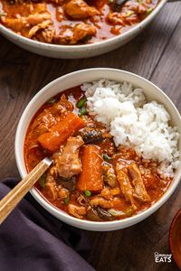 Delicious Slow Cooker Korean Chicken Stew! Inspired by my love for Korean cuisine, this recipe combines tender chicken thighs, mushrooms, and carrots with the delicious taste of gochujang, sesame oil, and garlic that create a flavoursome spicy sauce.