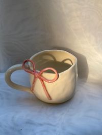 handmade ceramic bow mug