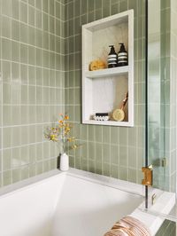 A Warm and Classic Primary Bathroom with Clever Storage Solutions | Rue