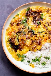 This rich and creamy Caramelized Onion Dal is the perfect comfort food for a cold day! It is bursting with flavor from caramelized onions and whole spices which are tempered in oil! Serve with rice for a delicious Indian meal.