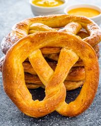 These are the World's Greatest Soft Pretzels, you know the ones I'm talking about! They're huge, soft, buttery and salty, not to mention totally addictive. #softpretzels #pretzels #recipe