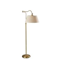 With a touch of urban edge, the Rodeo floor lamp modernizes the traditional bridge lamp, giving it an adjustable swing arm in addition to a curved pole. The swing arm rotates horizontally, while the shade can be adjusted vertically and secured with a locking key joint, allowing you to direct the light wherever it's needed. A textured cream colored drum shade brightens the design, softly distilling the light from a 150W bulb, while the antique brass finish adds mid-century modern flair. A 3-way rotary socket switch provides a variety of lighting options, allowing you to easily adjust the brightness between low, medium, and high. Complete your dcor with the coordinating Rodeo table lamp. Color: Brown.