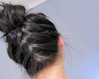 Upside down French braid with a bun.